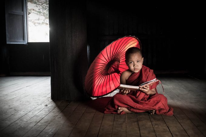 Novice and umbrella, Bagan